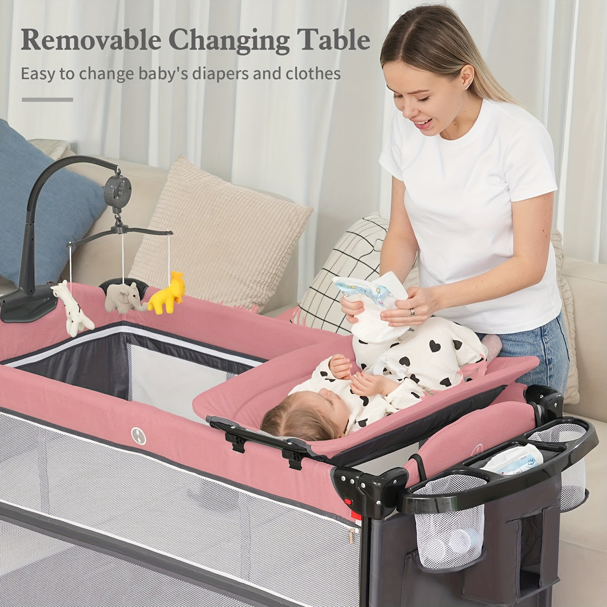 Foldable Baby Bassinet with Diaper Changing Station, 5-in-1 Infant Sleeper and Crib-Style Setup with Mattress Storage in Pink