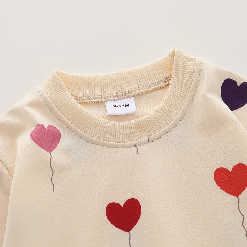 Heart Print Baby Outfit Set with Beige Long Sleeve Crewneck Top and Matching Cuffed Pants, Two-Piece Casual Clothing for Spring and Fall, 3-24M