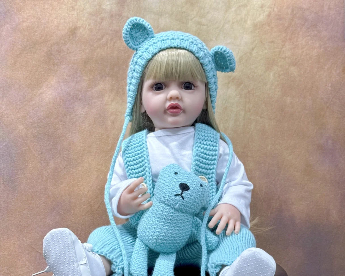 Long Hair Reborn Girl Doll with Fixed Acrylic Eyes, 20 Inch Toddler-Style Doll with Movable Limbs, Clothes, Magnetic Pacifier and Bottle