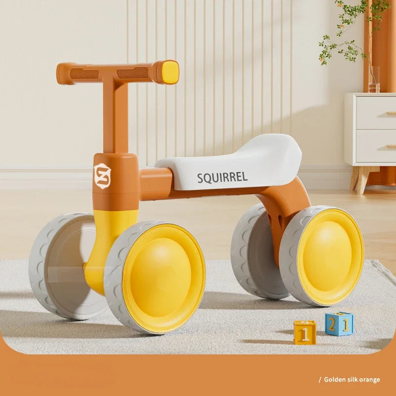 Toddler Four-Wheel Ride-On Bike in Green or Orange with Pedal-Free Design, Straight Handlebars and Shaped Seat for Supervised Play
