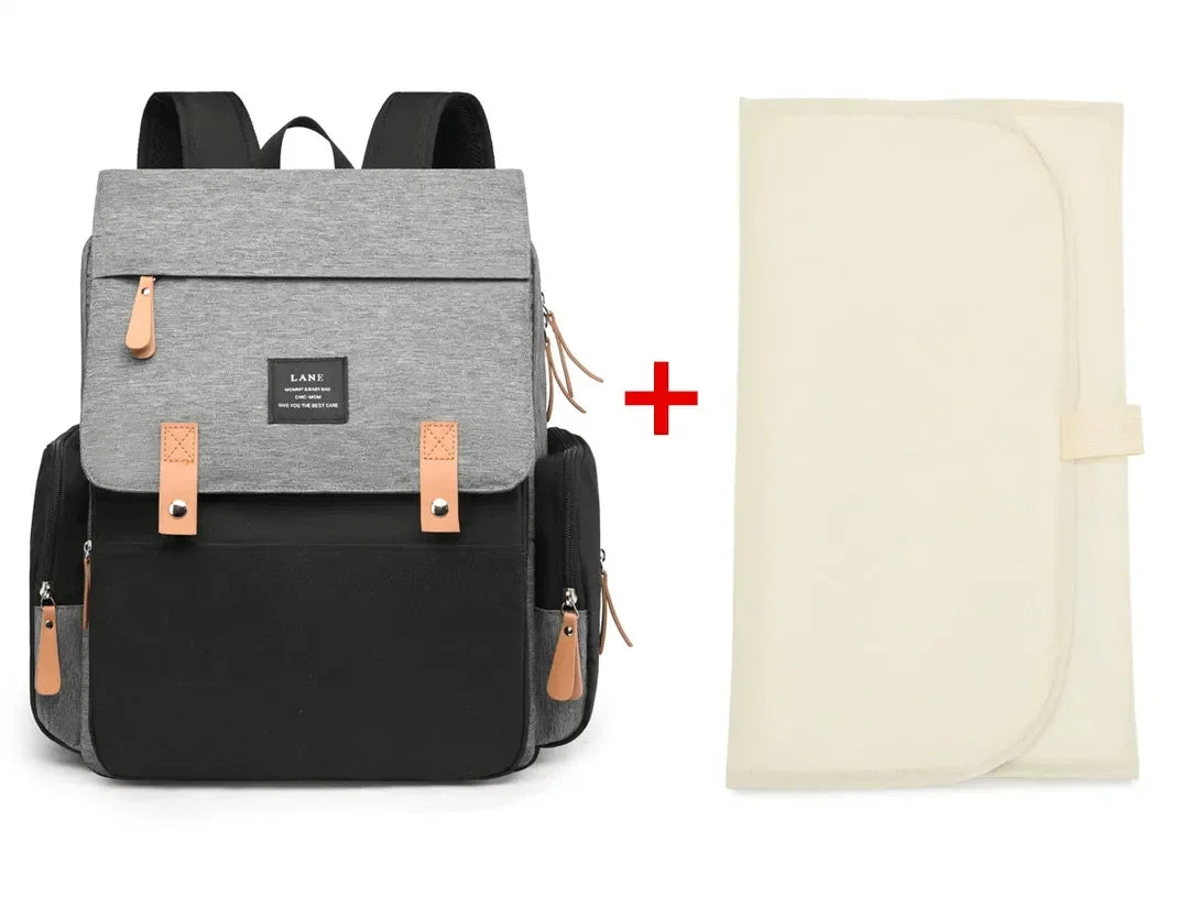 Flap-Top Diaper Backpack with Front Storage Pockets, Two Stroller Hooks and 53 x 34 cm Changing Mat for Baby Essentials and Everyday Parent Outings