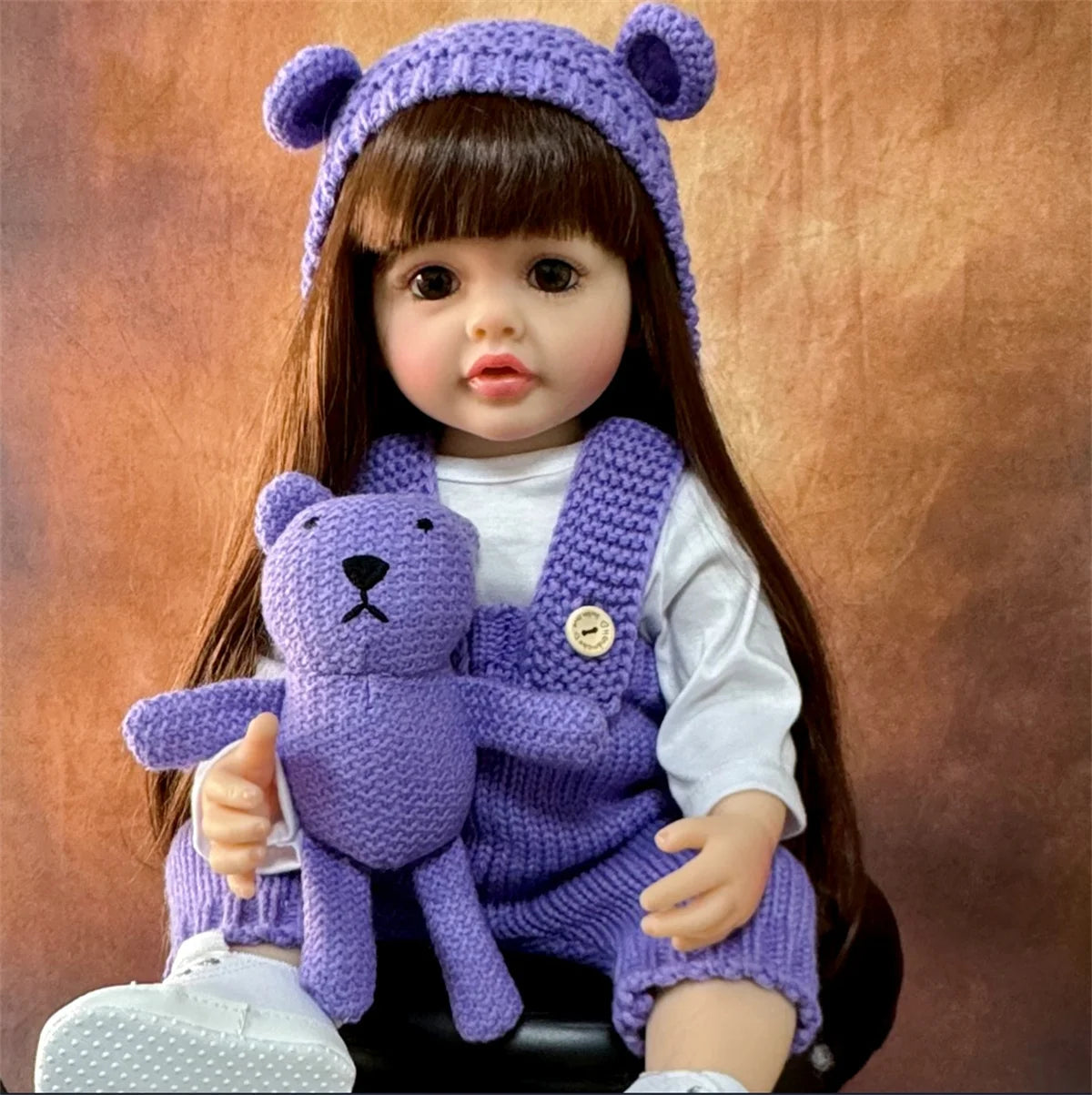 Long Hair Reborn Girl Doll with Fixed Acrylic Eyes, 20 Inch Toddler-Style Doll with Movable Limbs, Clothes, Magnetic Pacifier and Bottle