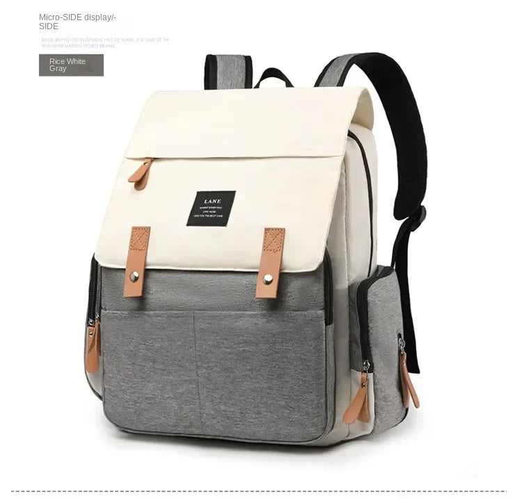 Flap-Top Diaper Backpack with Front Storage Pockets, Two Stroller Hooks and 53 x 34 cm Changing Mat for Baby Essentials and Everyday Parent Outings