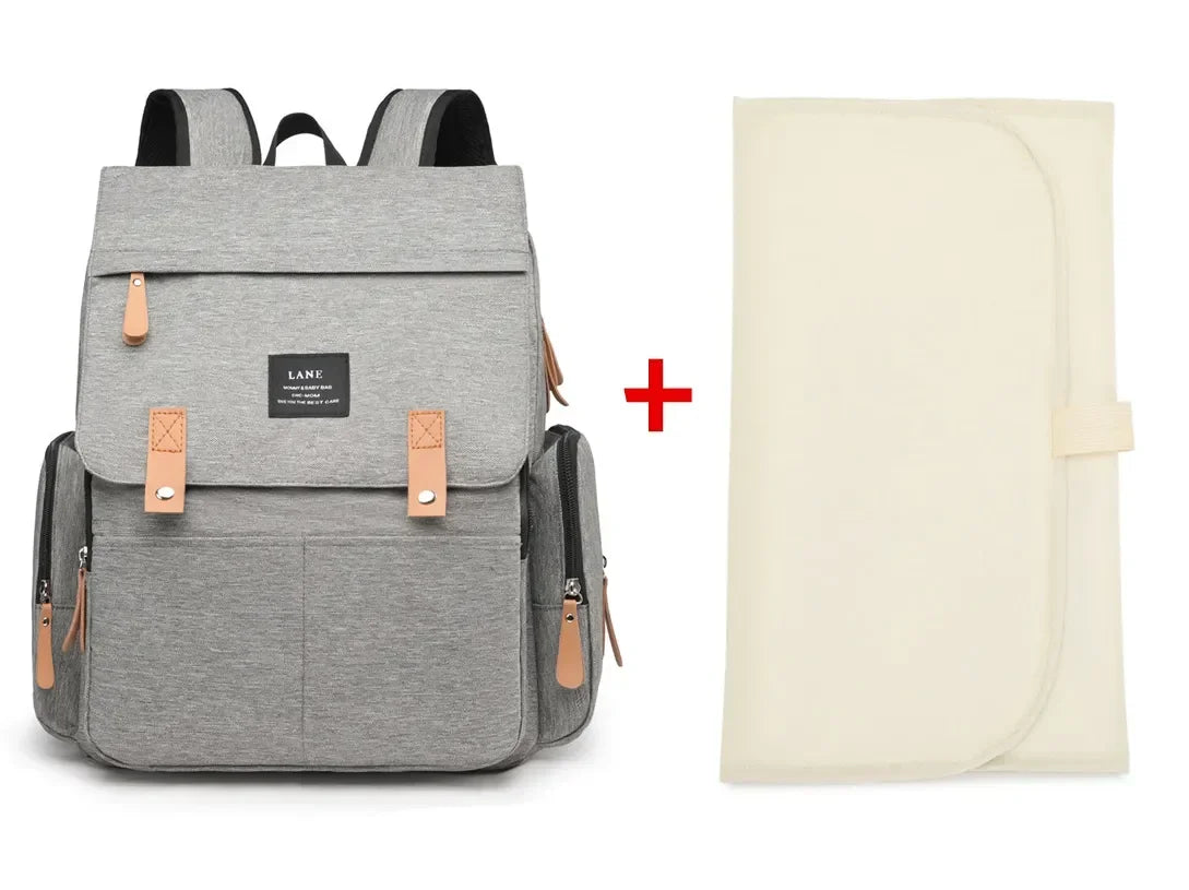 Flap-Top Diaper Backpack with Front Storage Pockets, Two Stroller Hooks and 53 x 34 cm Changing Mat for Baby Essentials and Everyday Parent Outings