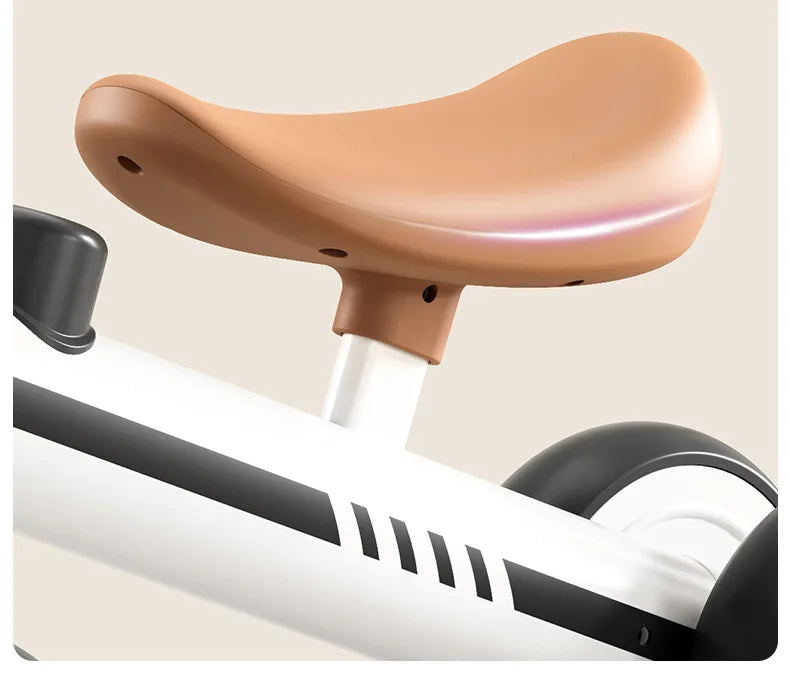 Lightweight Toddler Balance Bike for Ages 1ā3, Ivory or Orange Kids Riding Toy for Supervised Playtime and First Birthday Gift Ideas