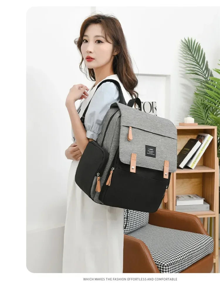 Flap-Top Diaper Backpack with Front Storage Pockets, Two Stroller Hooks and 53 x 34 cm Changing Mat for Baby Essentials and Everyday Parent Outings