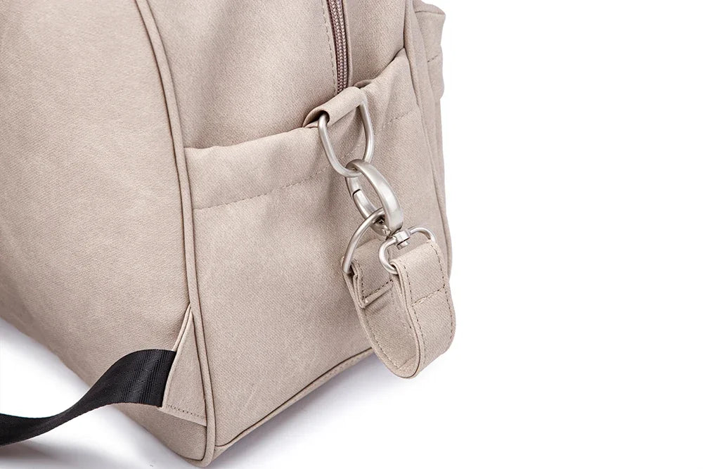 Diaper Bag Backpack by Soboba with Front Zipper Pocket, Top Carry Handle and Solid Color Styling for Baby Care Essentials and Everyday Outings
