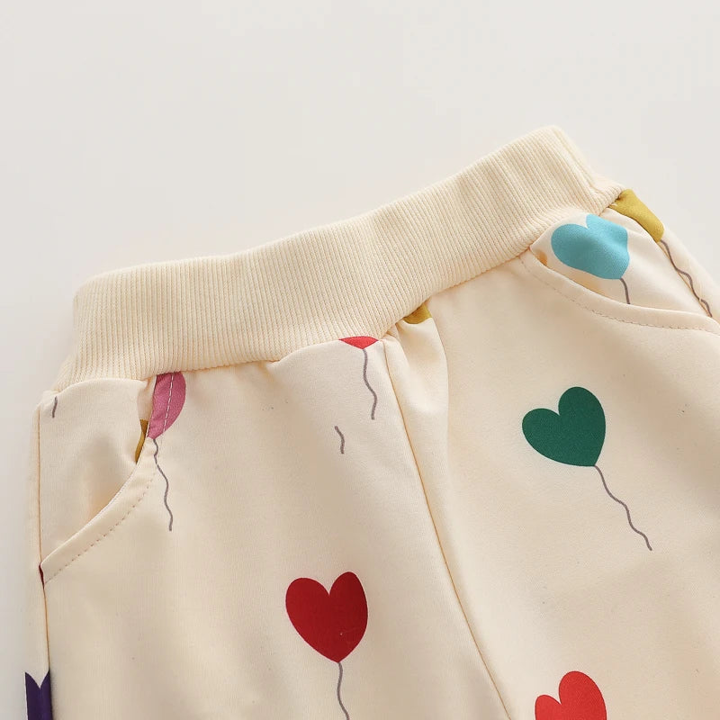 Heart Print Baby Outfit Set with Beige Long Sleeve Crewneck Top and Matching Cuffed Pants, Two-Piece Casual Clothing for Spring and Fall, 3-24M