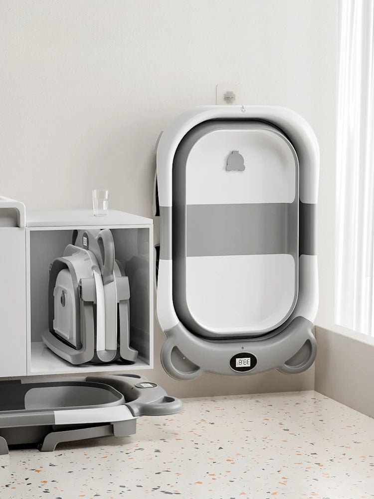 Travel Baby Bathtub with Thermometer and Soft Floating Cushion, Collapsible PP and TPE Bath Tub with Drain Plug for Supervised Infant and Toddler Bathing