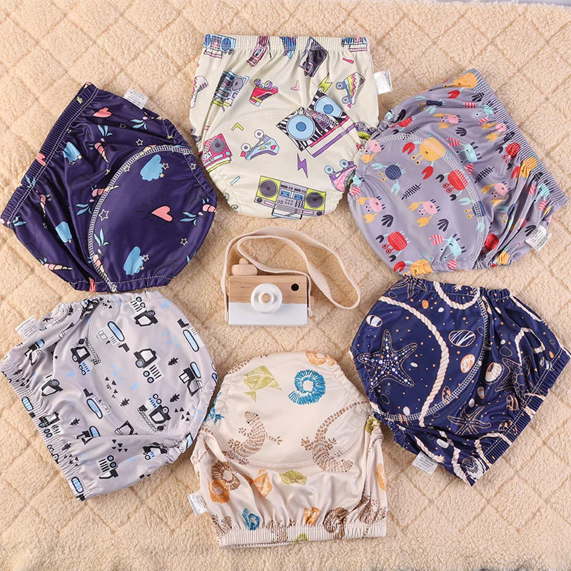 Washable Potty Training Pants Multipack, 4 or 8 Reusable Toddler Underwear Briefs with Printed Designs for Daytime Toilet Learning, Sizes S-XL