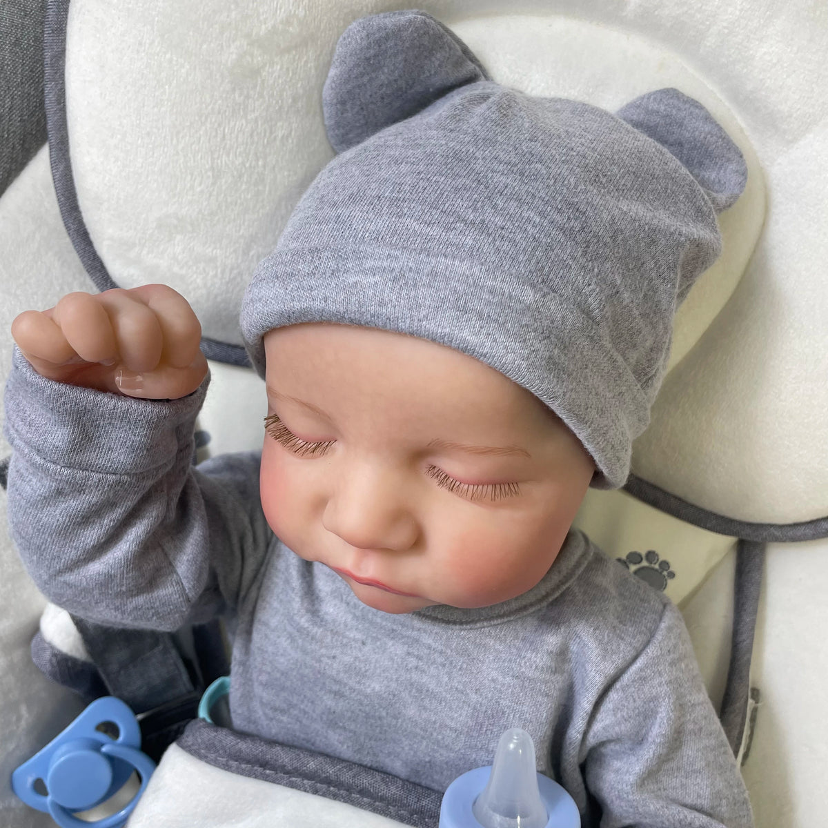 Levi Sleeping Reborn Baby Doll, 17-18 Inch Vinyl Boy or Genderless Cloth Body with Painted Hair, Gray Clothes, Pacifier, Bottle and Birth Card