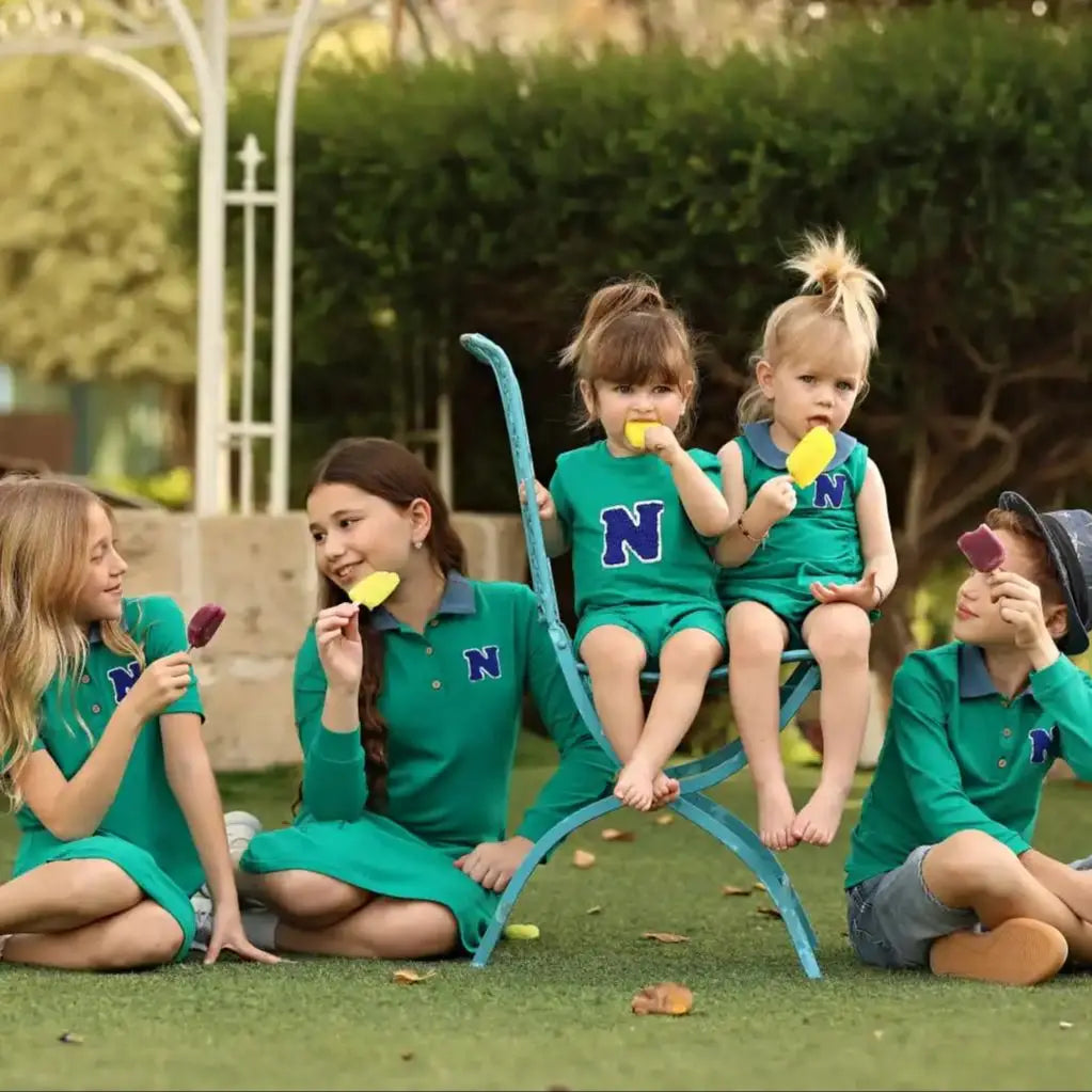 Green Polo Kids Outfits with Navy Letter Patch, Coordinating Girls Dresses, Boys Shirts and Shorts and Baby Girl Set Styles for Family Photos