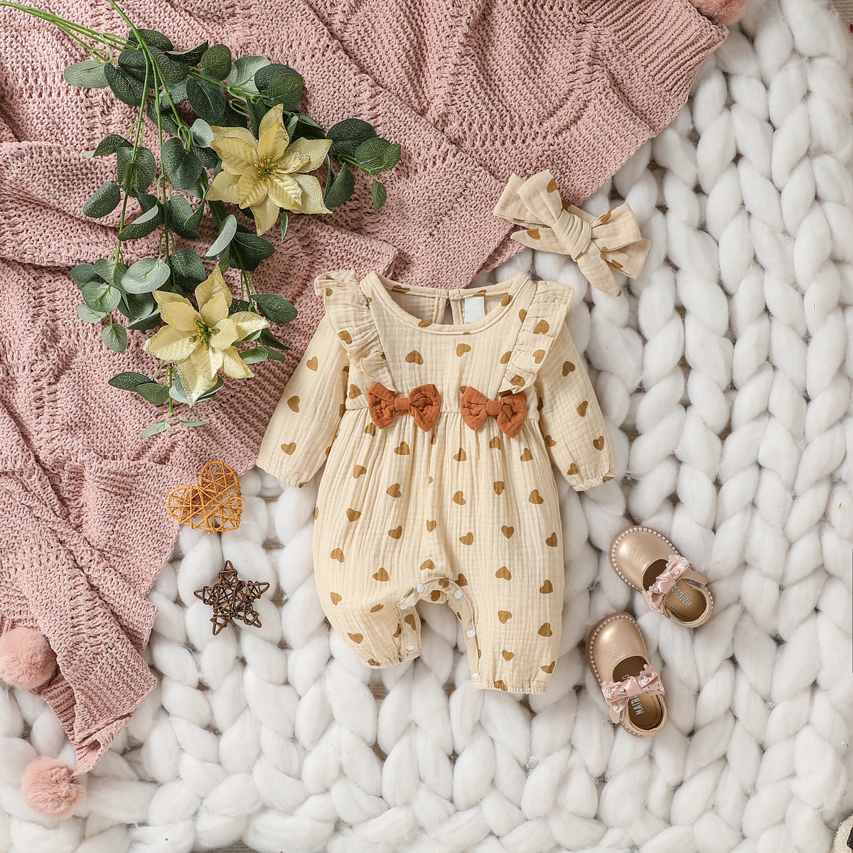 Baby Girl Heart Print Romper with Shoulder Ruffles and Bow Details, Long Sleeve Cotton Jumpsuit with Inner-Leg Snaps, Sizes 0-6 Months