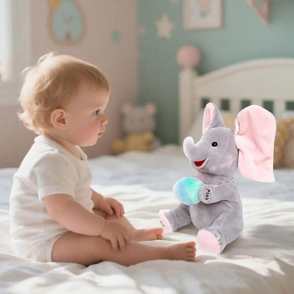 Peekaboo Singing Elephant Plush Toy, 25 cm Gray Interactive Musical Stuffed Animal with Moving Ears for Supervised Toddler Play Over 12 Months