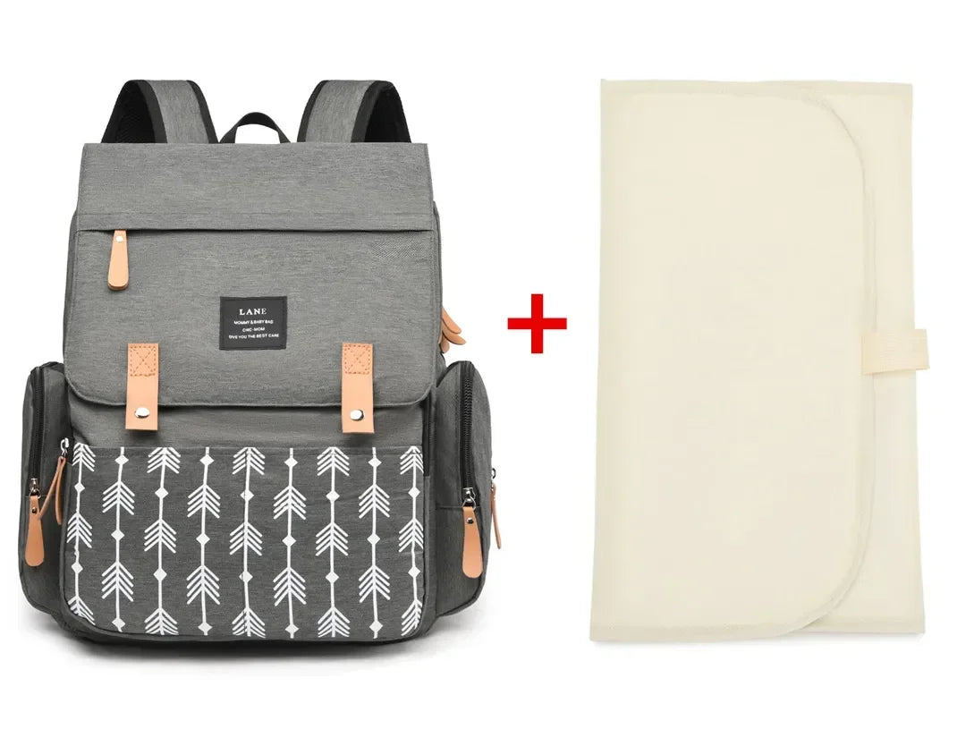 Flap-Top Diaper Backpack with Front Storage Pockets, Two Stroller Hooks and 53 x 34 cm Changing Mat for Baby Essentials and Everyday Parent Outings
