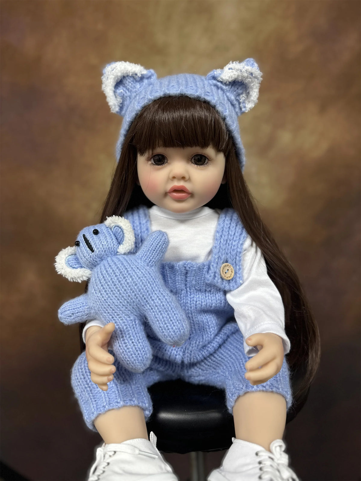 Long Hair Reborn Girl Doll with Fixed Acrylic Eyes, 20 Inch Toddler-Style Doll with Movable Limbs, Clothes, Magnetic Pacifier and Bottle