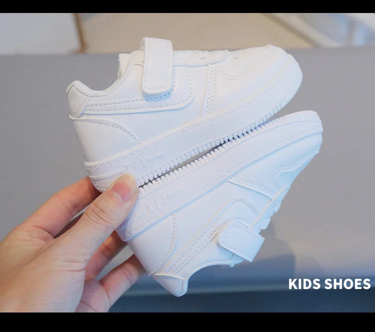 Kids White Low-Top Sneakers with Adjustable Strap, Perforated Toe and Silver Heel Detail for Boys and Girls Spring and Fall Casual Outfits