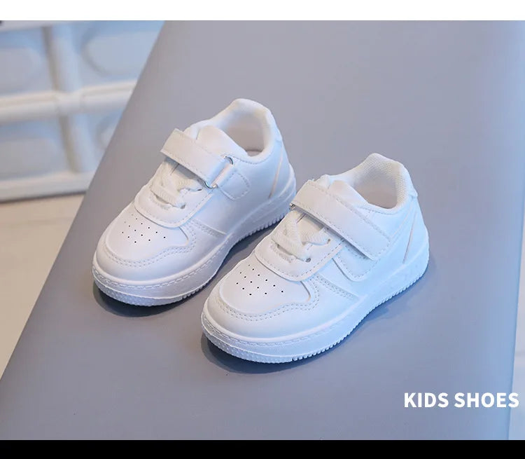 Kids White Low-Top Sneakers with Adjustable Strap, Perforated Toe and Silver Heel Detail for Boys and Girls Spring and Fall Casual Outfits