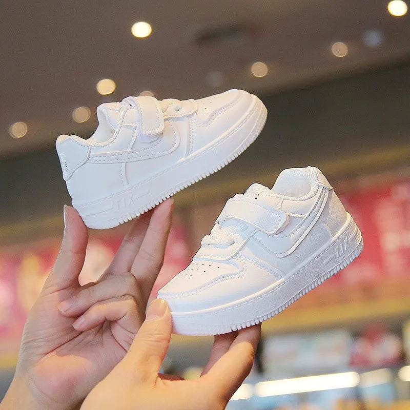 Kids White Low-Top Sneakers with Adjustable Strap, Perforated Toe and Silver Heel Detail for Boys and Girls Spring and Fall Casual Outfits