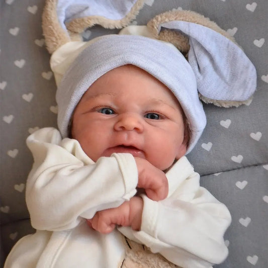 Awake Reborn Baby Doll Elijah, 19-Inch Soft Cloth Body with Hand-Rooted Hair, Layered Painted Details, Bunny Outfit, Bottle and Magnetic Pacifier