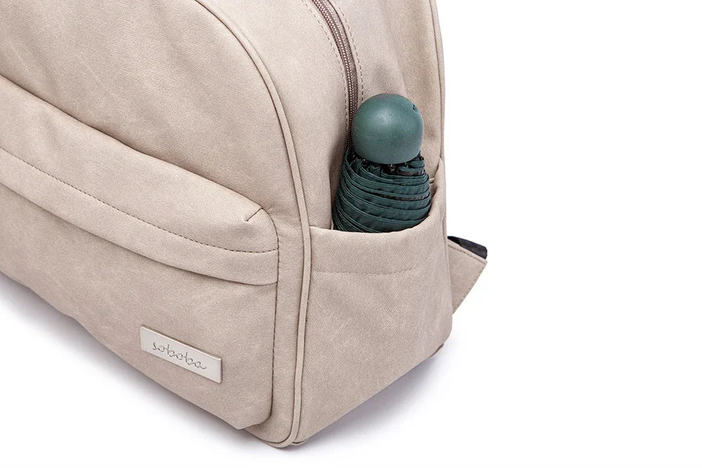 Diaper Bag Backpack by Soboba with Front Zipper Pocket, Top Carry Handle and Solid Color Styling for Baby Care Essentials and Everyday Outings