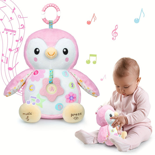 Penguin Sensory Toy for Baby, Musical Plush Animal with Textured Hanging Ring, Rattles and Crinkle Paper in Pink or Blue for Supervised Play