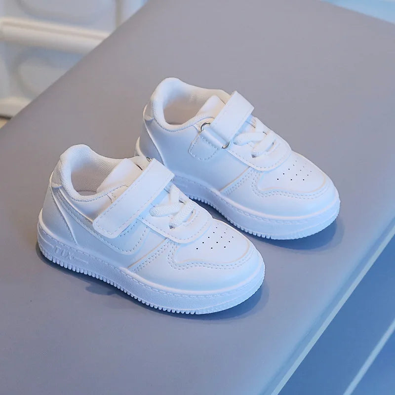 Kids White Low-Top Sneakers with Adjustable Strap, Perforated Toe and Silver Heel Detail for Boys and Girls Spring and Fall Casual Outfits