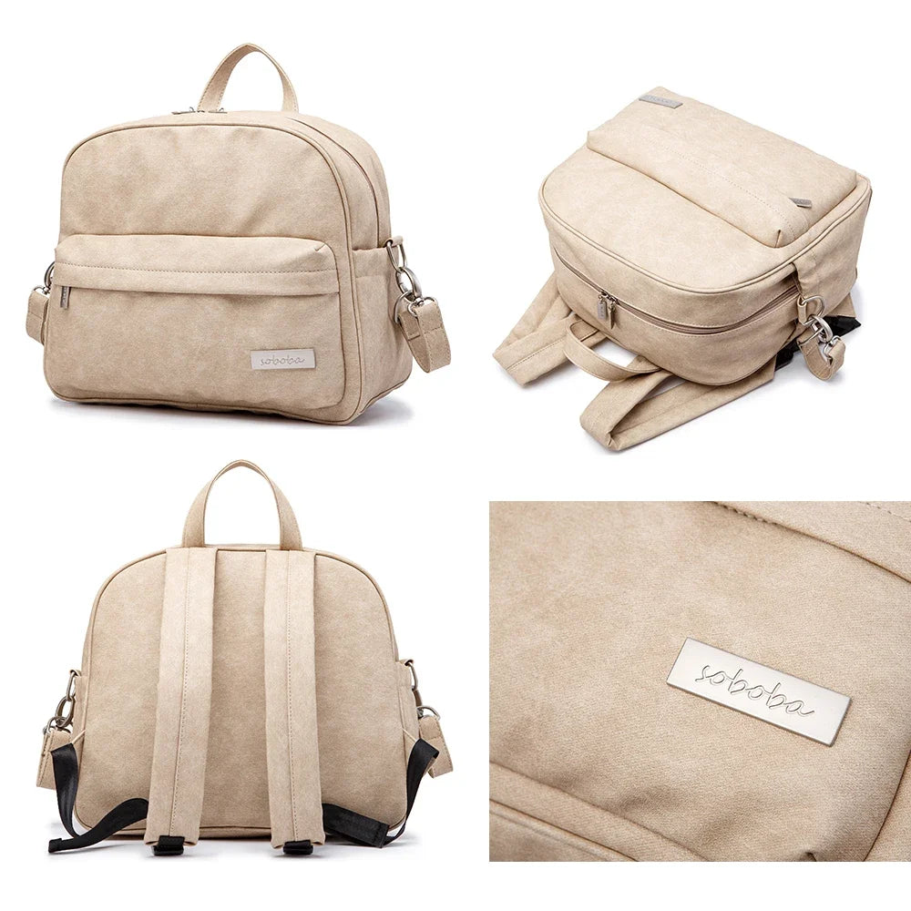 Diaper Bag Backpack by Soboba with Front Zipper Pocket, Top Carry Handle and Solid Color Styling for Baby Care Essentials and Everyday Outings