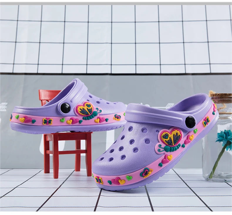 Dinosaur Kids Garden Clogs with Ventilation Holes and Pivoting Heel Strap, Closed-Toe Slip-On Summer Shoes for Boys and Girls Casual Outfits