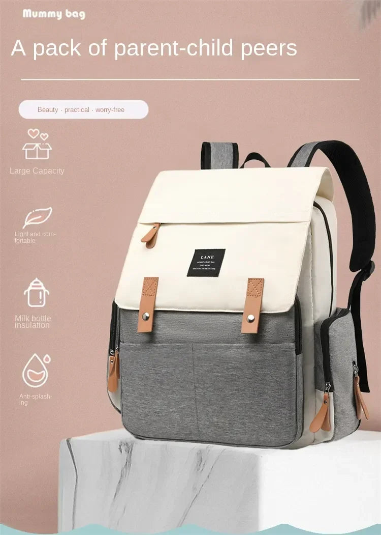 Flap-Top Diaper Backpack with Front Storage Pockets, Two Stroller Hooks and 53 x 34 cm Changing Mat for Baby Essentials and Everyday Parent Outings