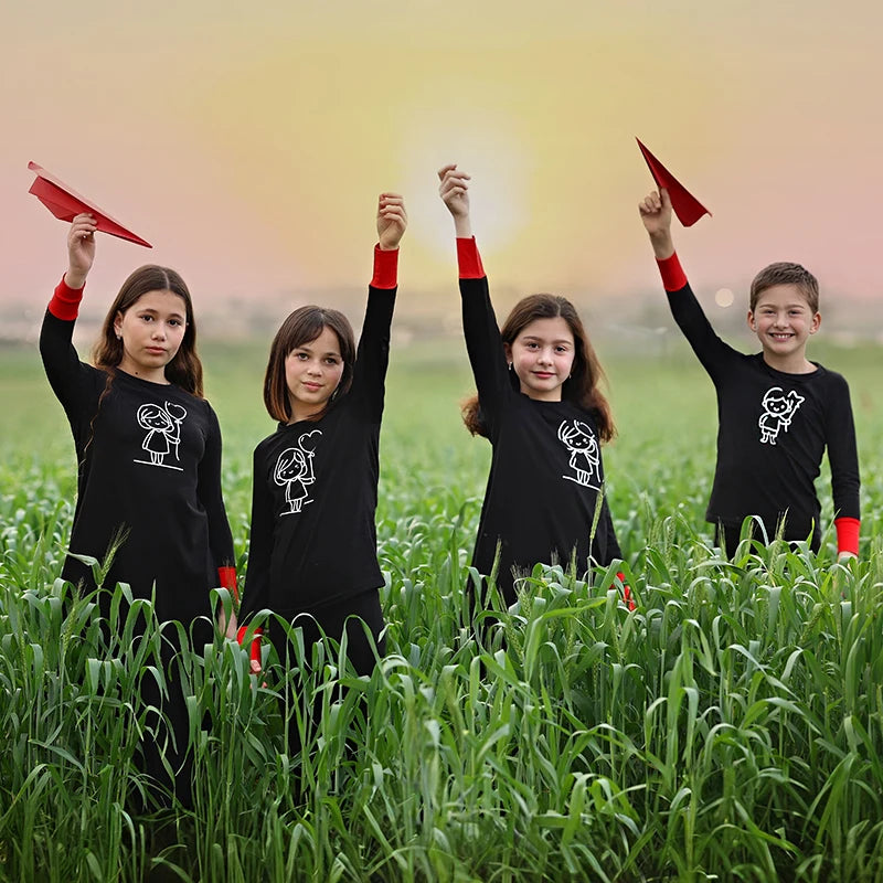 Kids Matching Pajamas with Red Cuffs and White Character Graphics, Black Sibling Outfit Styles with Two-Piece Sets, Nightgown and Footie Options