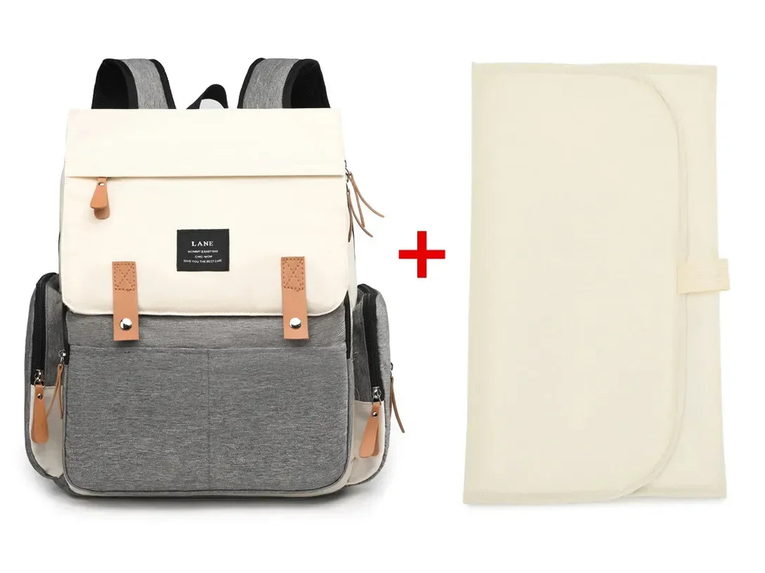 Flap-Top Diaper Backpack with Front Storage Pockets, Two Stroller Hooks and 53 x 34 cm Changing Mat for Baby Essentials and Everyday Parent Outings