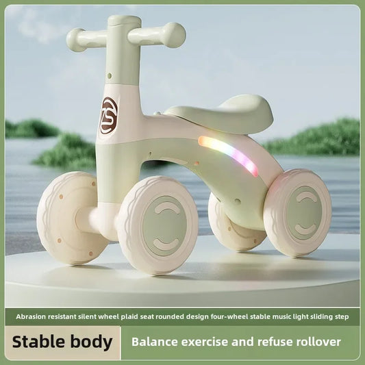 Four-Wheel Toddler Balance Glider with Rounded Handlebars and Shaped Seat, Pink or Green Foot-Powered Ride-On for Supervised Play