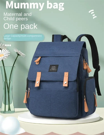Flap-Top Diaper Backpack with Front Storage Pockets, Two Stroller Hooks and 53 x 34 cm Changing Mat for Baby Essentials and Everyday Parent Outings