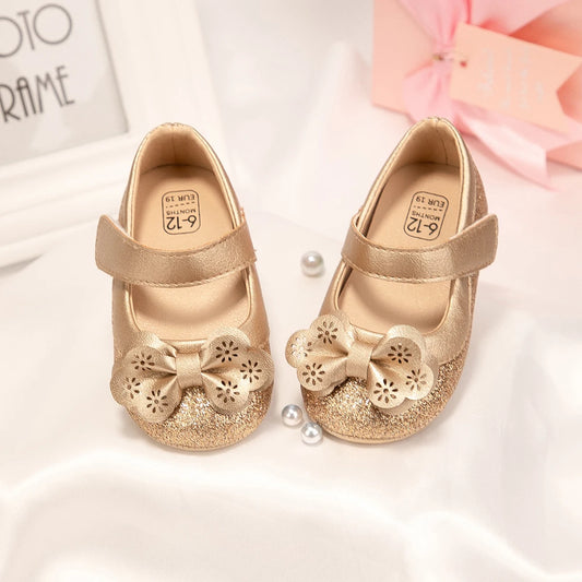 Gold Baby Girl Dress Shoes with Floral Cutout Bow, Glitter Toe and Mary Jane Strap, Infant Party and Photo Outfit Shoes in 0-18 Month Sizes