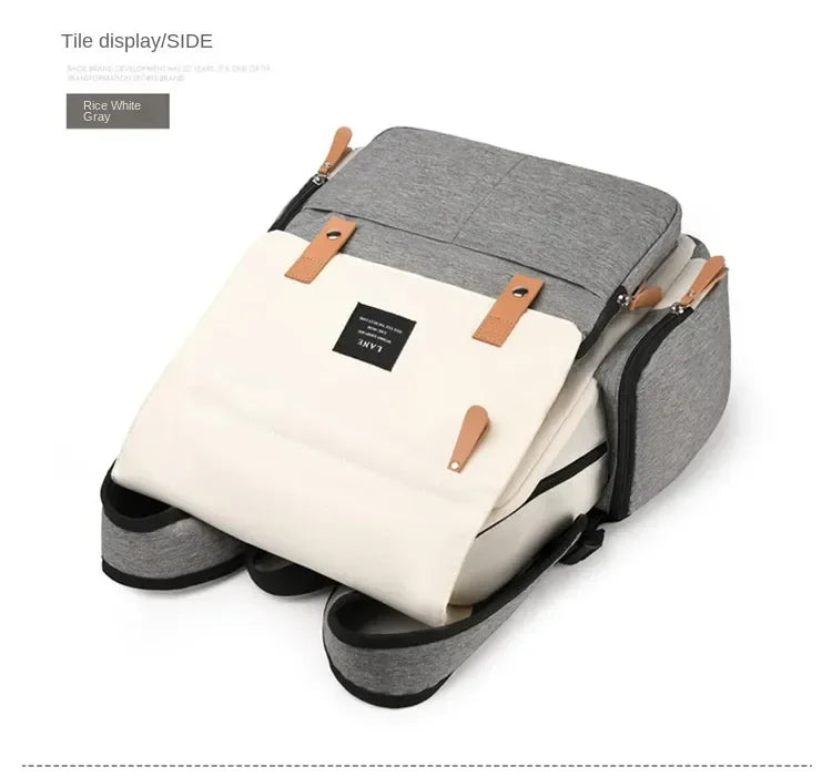 Flap-Top Diaper Backpack with Front Storage Pockets, Two Stroller Hooks and 53 x 34 cm Changing Mat for Baby Essentials and Everyday Parent Outings