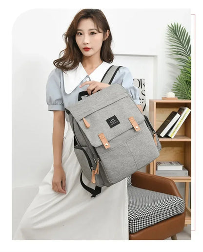 Flap-Top Diaper Backpack with Front Storage Pockets, Two Stroller Hooks and 53 x 34 cm Changing Mat for Baby Essentials and Everyday Parent Outings
