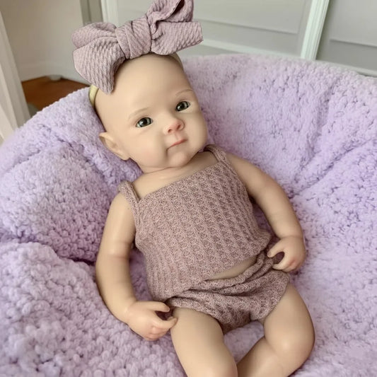 Bettie Reborn Girl Doll with Two Outfits and Bottle, 13-Inch Solid Silicone Baby Doll with Open Eyes and Painted Finish for Collectors