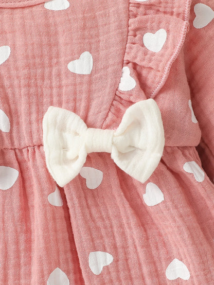 Baby Girl Heart Print Romper with Shoulder Ruffles and Bow Details, Long Sleeve Cotton Jumpsuit with Inner-Leg Snaps, Sizes 0-6 Months