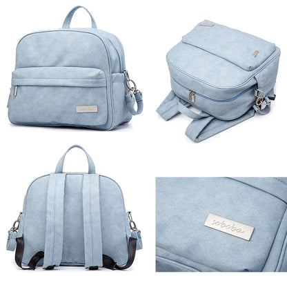 Diaper Bag Backpack by Soboba with Front Zipper Pocket, Top Carry Handle and Solid Color Styling for Baby Care Essentials and Everyday Outings