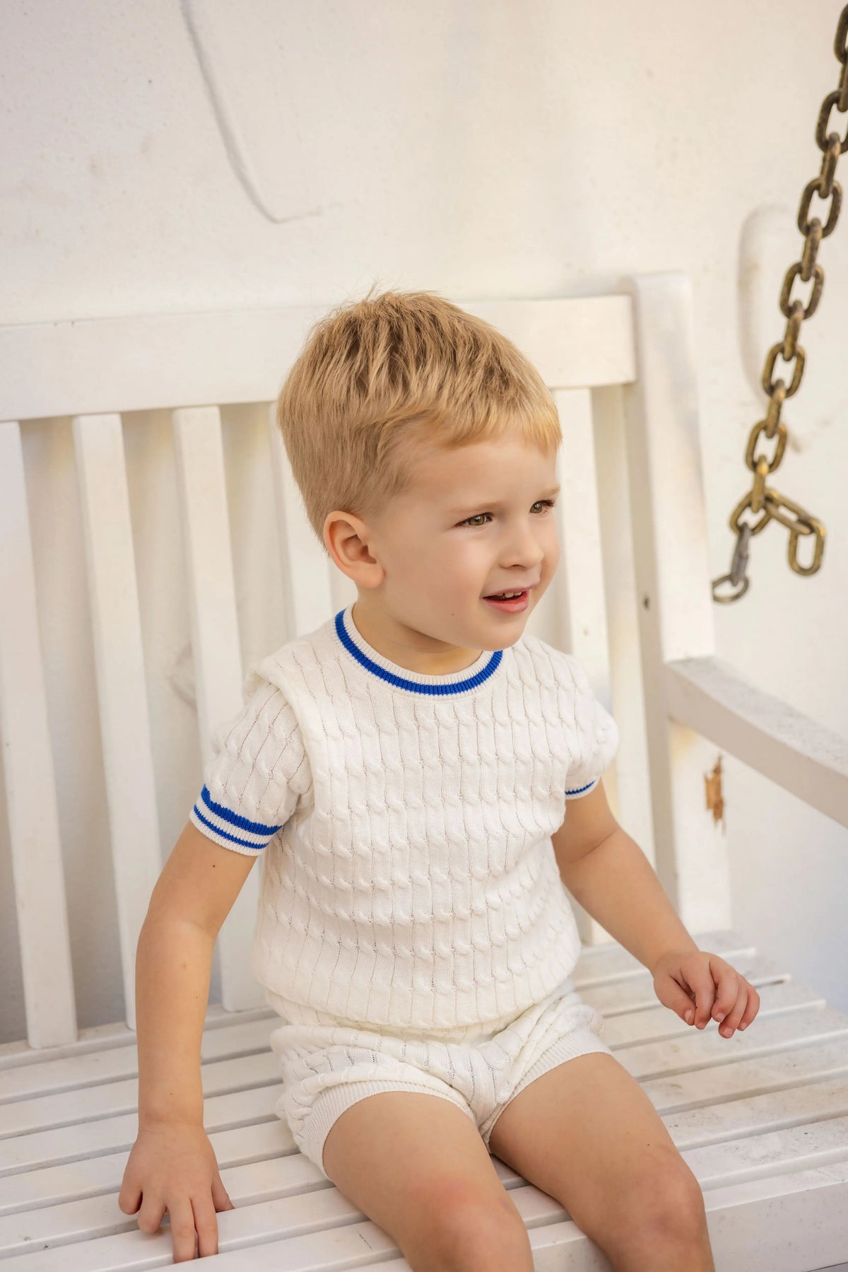 Blue Floral Sibling Outfits with Smocked Girls Dress and Baby Romper Options, Coordinating Boys Knit Tops, Polo and Shorts for Family Photos