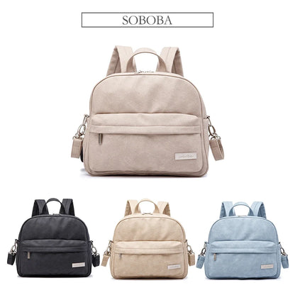 Diaper Bag Backpack by Soboba with Front Zipper Pocket, Top Carry Handle and Solid Color Styling for Baby Care Essentials and Everyday Outings