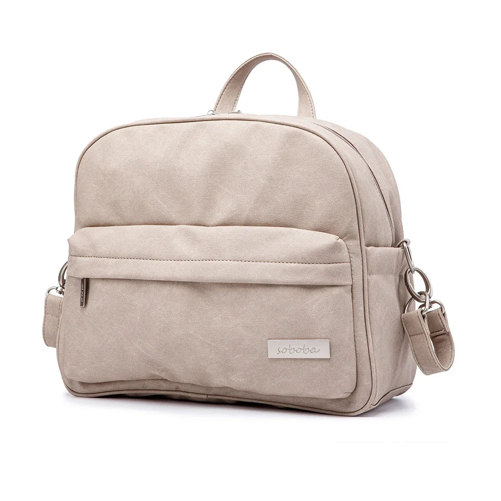 Diaper Bag Backpack by Soboba with Front Zipper Pocket, Top Carry Handle and Solid Color Styling for Baby Care Essentials and Everyday Outings
