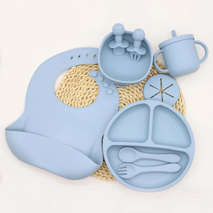 Baby Silicone Tableware Set, 9-Piece Mealtime Collection with Divided Plate, Suction Bowl, Pocket Bib, 2-in-1 Cup and Utensils in Four Colors