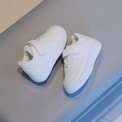 Kids White Low-Top Sneakers with Adjustable Strap, Perforated Toe and Silver Heel Detail for Boys and Girls Spring and Fall Casual Outfits