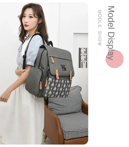 Flap-Top Diaper Backpack with Front Storage Pockets, Two Stroller Hooks and 53 x 34 cm Changing Mat for Baby Essentials and Everyday Parent Outings