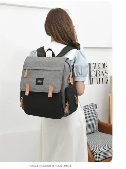 Flap-Top Diaper Backpack with Front Storage Pockets, Two Stroller Hooks and 53 x 34 cm Changing Mat for Baby Essentials and Everyday Parent Outings