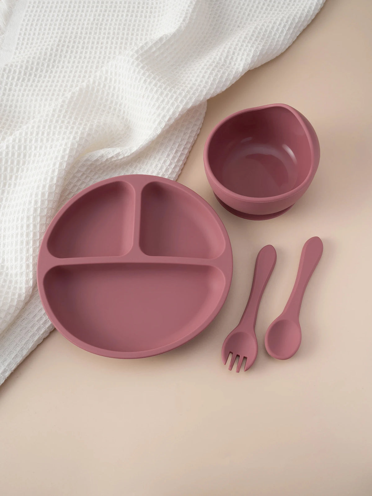 Four-Piece Silicone Baby Feeding Set with Three-Section Suction Plate, Bowl, Spoon and Fork for Supervised Toddler Meals in Ten Color Options