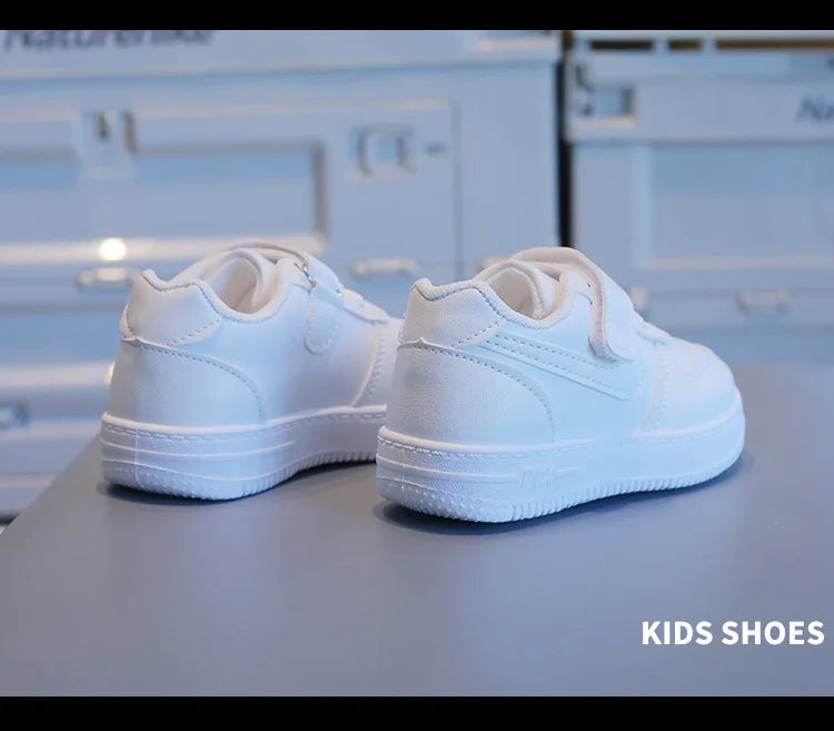 Kids White Low-Top Sneakers with Adjustable Strap, Perforated Toe and Silver Heel Detail for Boys and Girls Spring and Fall Casual Outfits