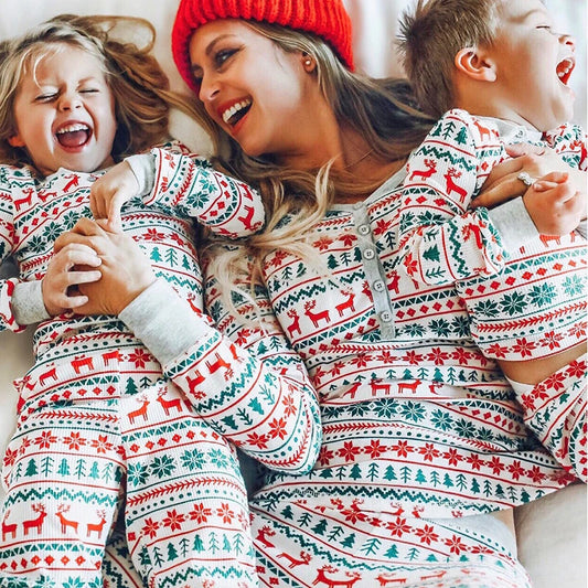 White Fair Isle Family Christmas Pajamas with Red and Green Reindeer, Snowflake and Tree Prints, Matching Holiday Outfits for Parents and Kids